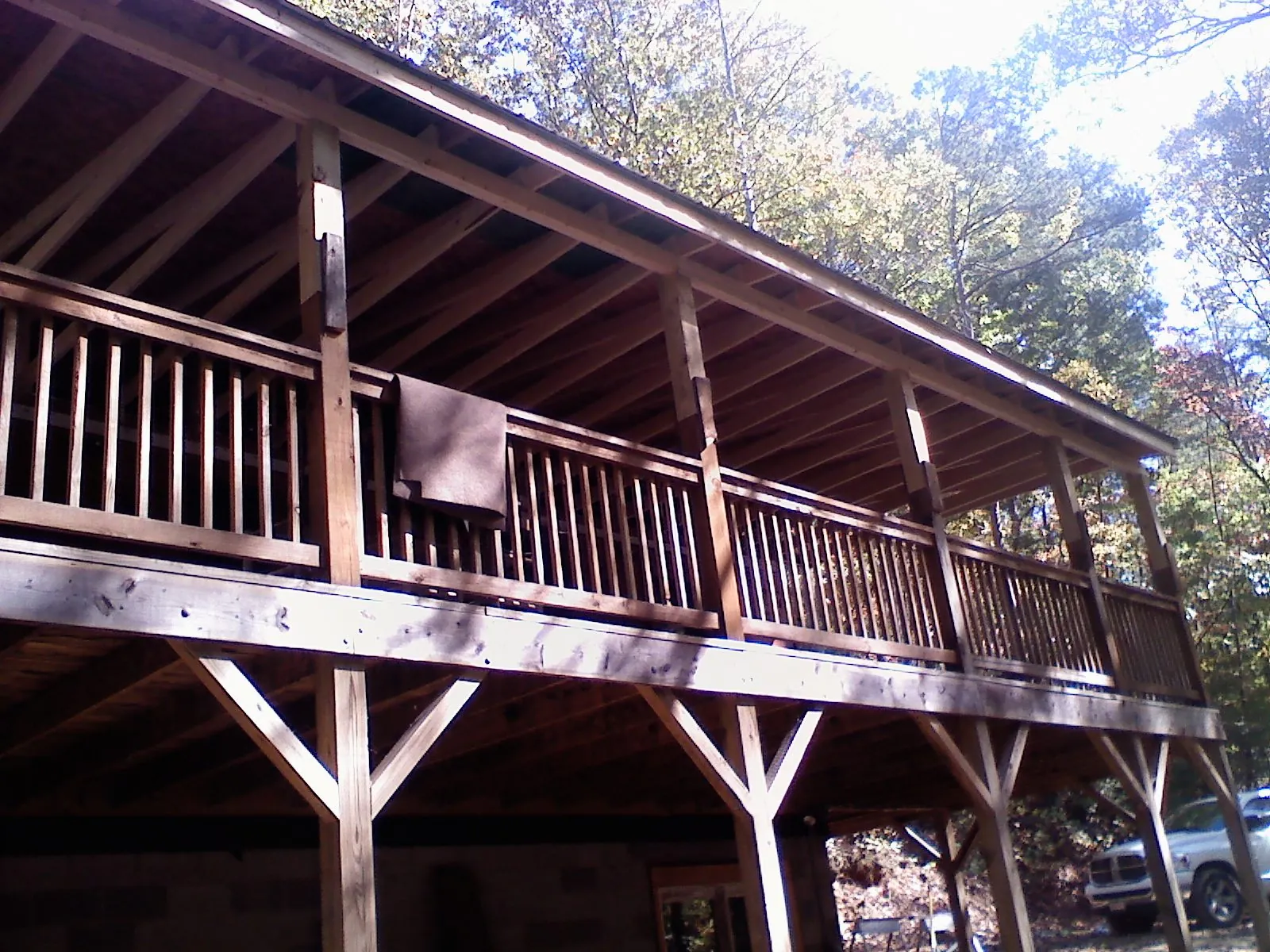 Timber framing under a new elevated porch and deck — Roof Leak Repair in Blue Island by Roofing Brothers